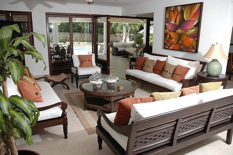 buyDRproperty Living room with white sofas and pillows, Beautiful VILLA BRILLANTE Sosua Real Estate