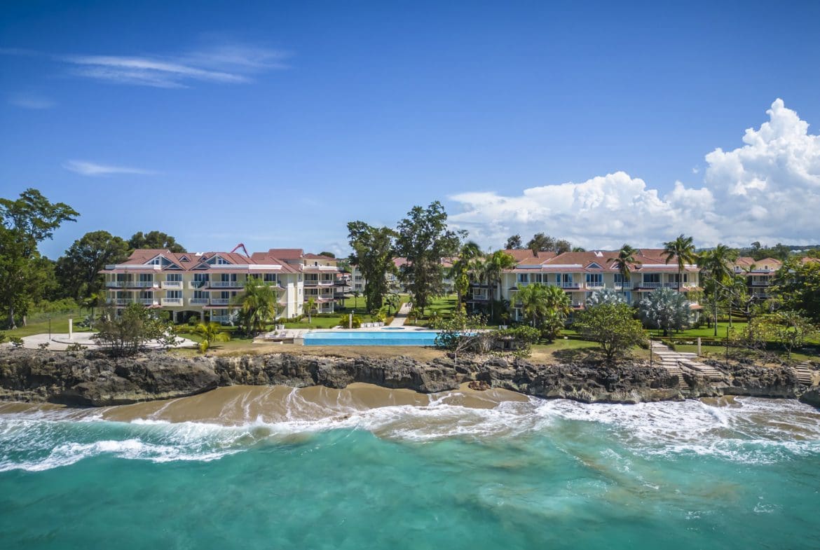 buyDRproperty Oceanfront condo complex in Sosua with pool and beach. Beautiful turquoise water. Sosua Real Estate
