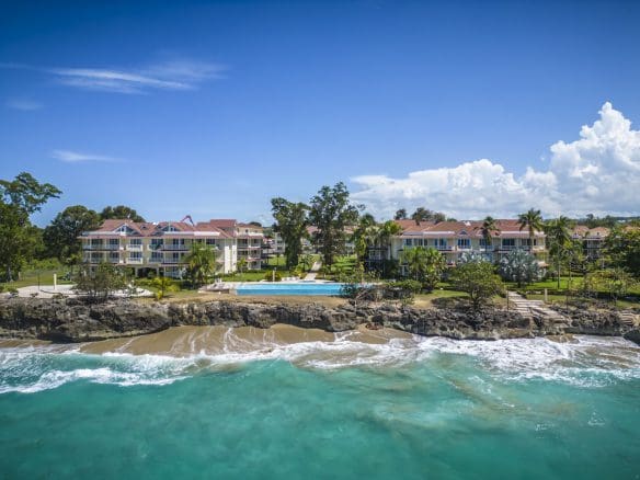 buyDRproperty Oceanfront condo complex in Sosua with pool and beach. Beautiful turquoise water. Sosua Real Estate
