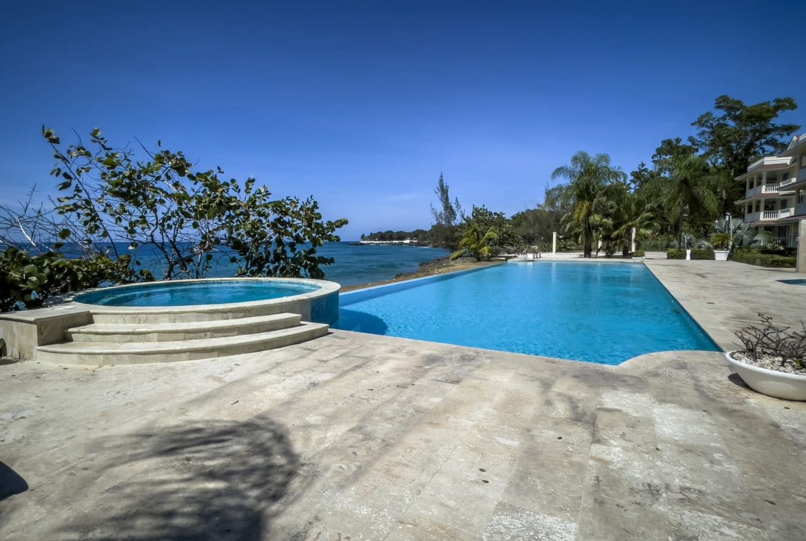 buyDRproperty Oceanfront pool and jacuzzi at a Sosua condo with ocean views. Sosua Real Estate