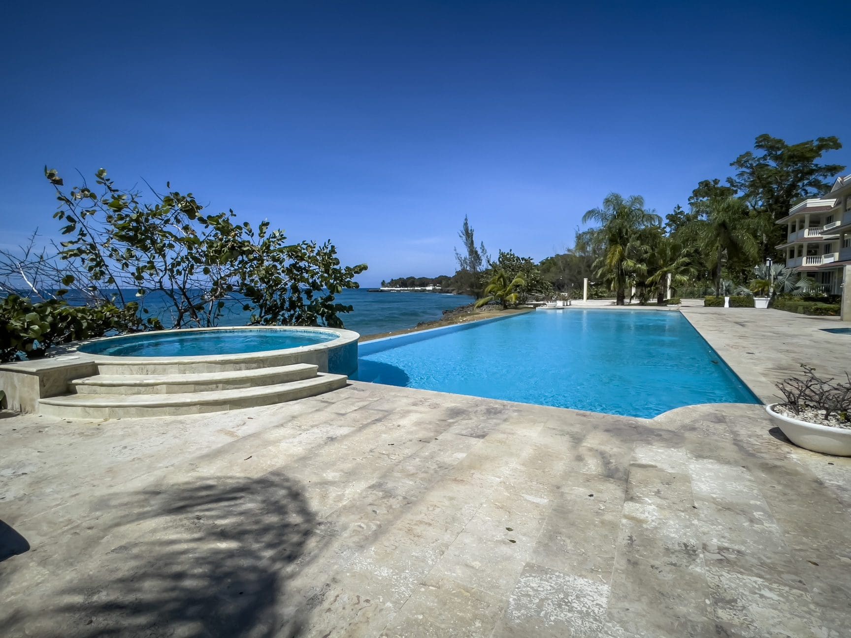 buyDRproperty Oceanfront pool and jacuzzi at a Sosua condo with ocean views. Sosua Real Estate