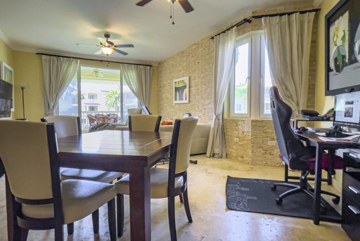 buyDRproperty Dining area in a beautiful oceanfront condo for sale in Sosua. Sosua Real Estate