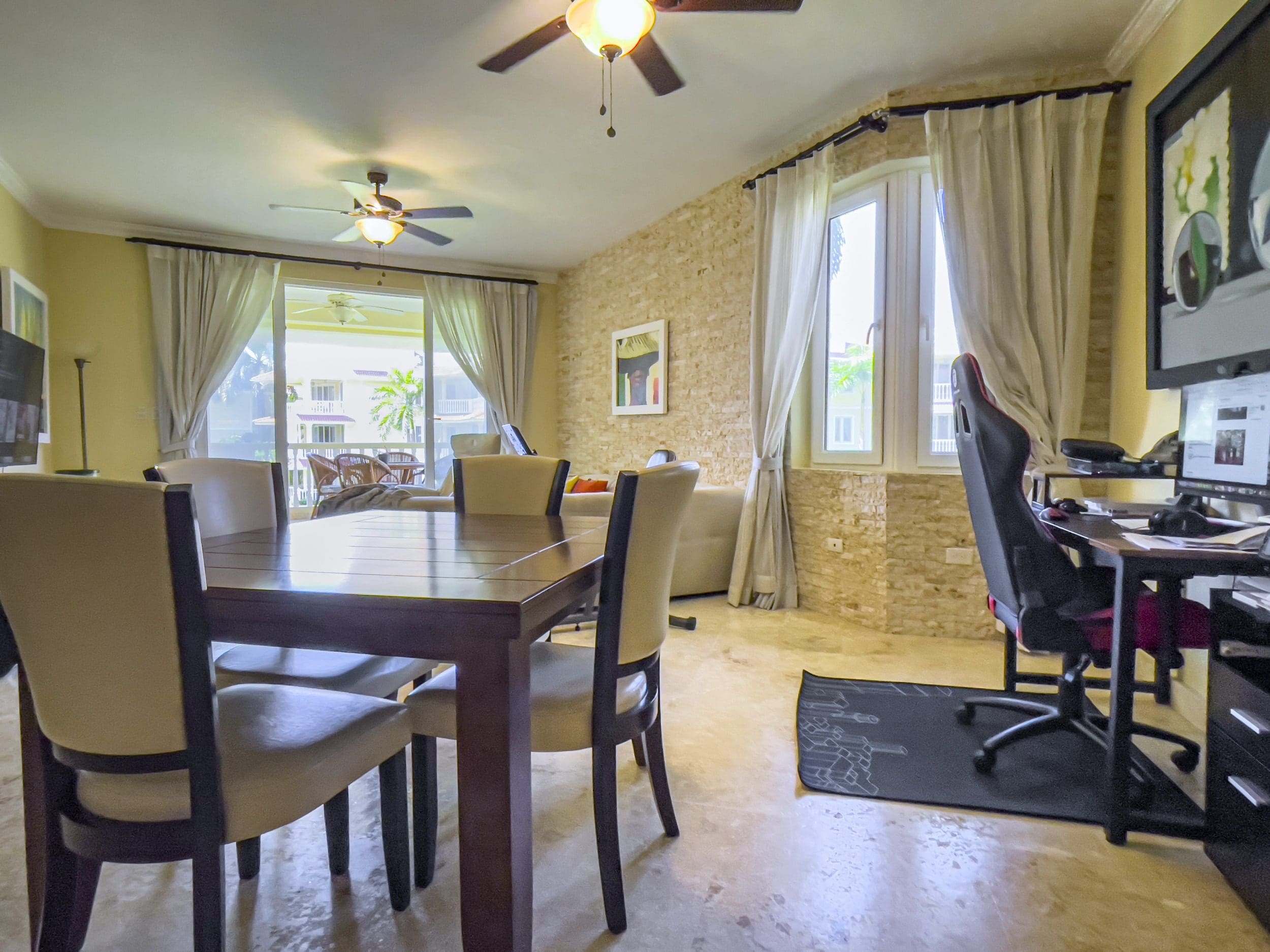 buyDRproperty Dining area in a beautiful oceanfront condo for sale in Sosua. Sosua Real Estate