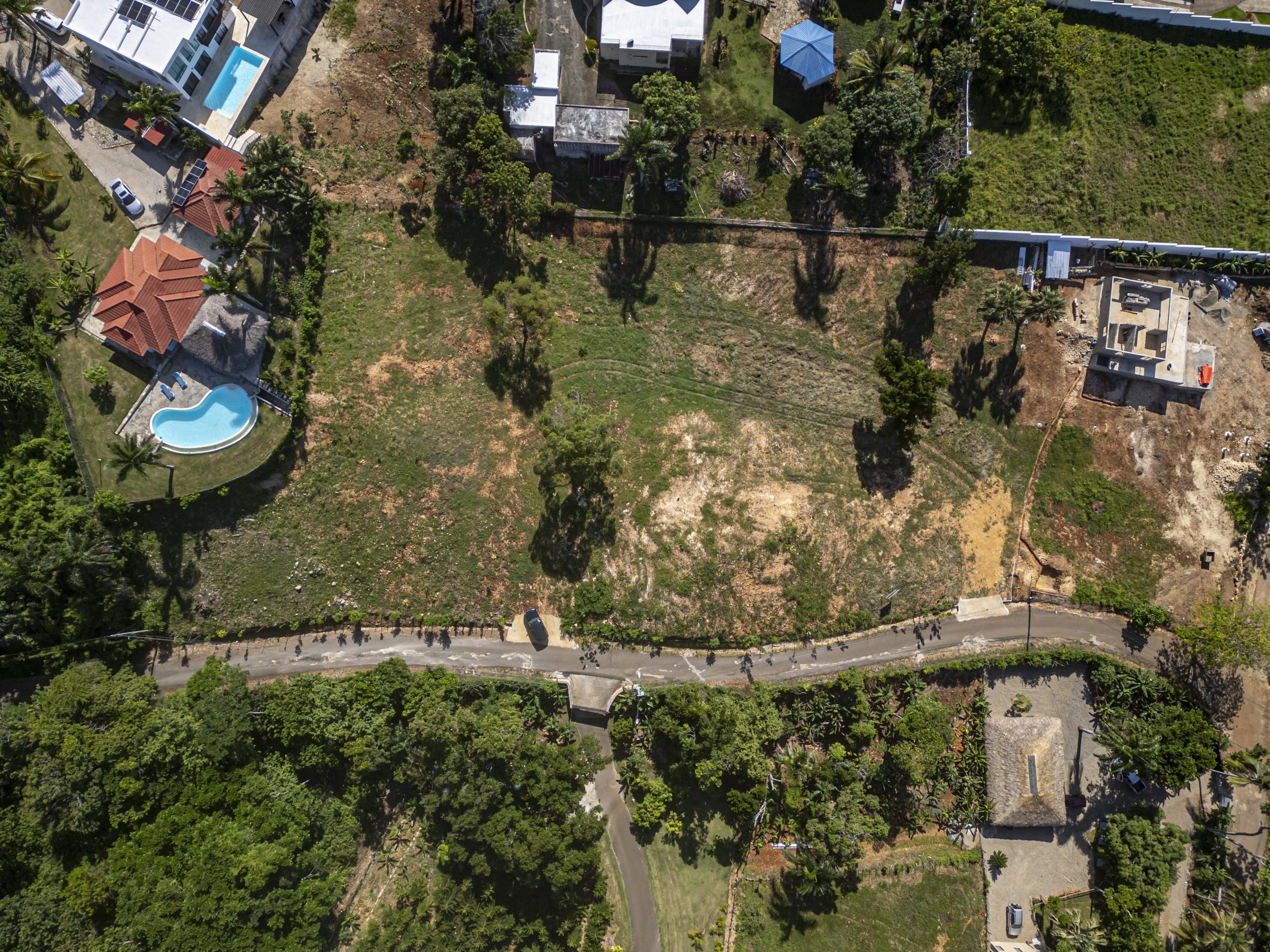 buyDRproperty Aerial view of a beautiful ocean view lot for sale in Sosua. Sosua Real Estate