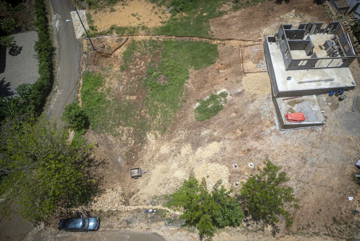 buyDRproperty Aerial view of a building under construction on a Sosua building lot in the Dominican Republic. Sosua Real Estate