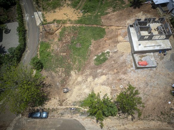 buyDRproperty Aerial view of a building under construction on a Sosua building lot in the Dominican Republic. Sosua Real Estate