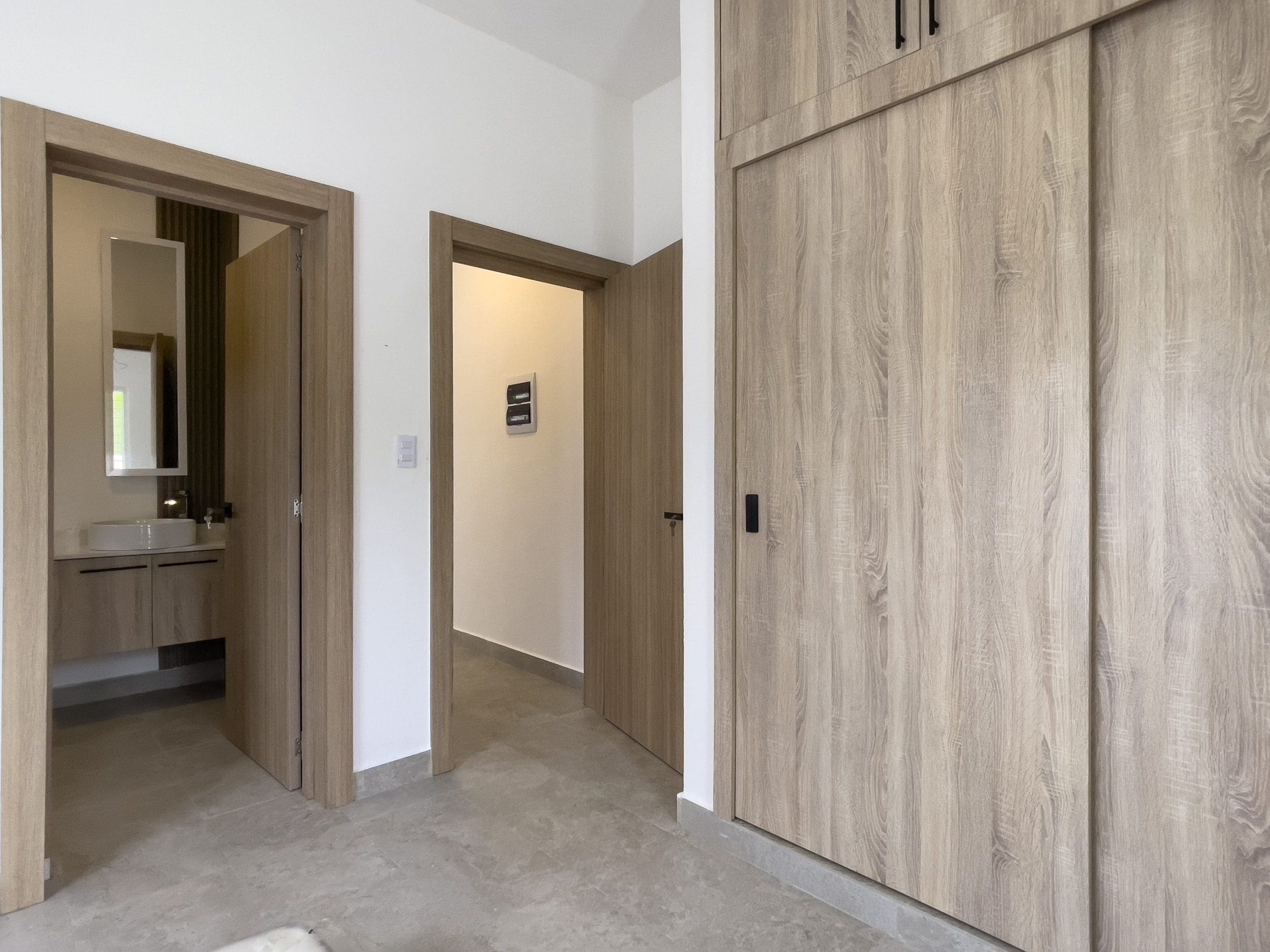 buyDRproperty Modern villa interior with wooden doors. Villa for sale. Sosua Real Estate