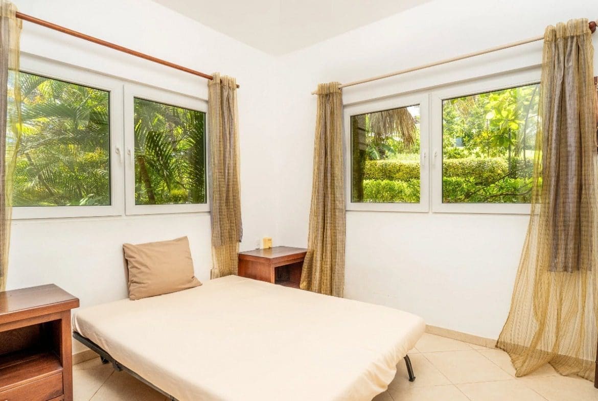 buyDRproperty Bedroom with tropical views, part of a villa for sale. Sosua Real Estate