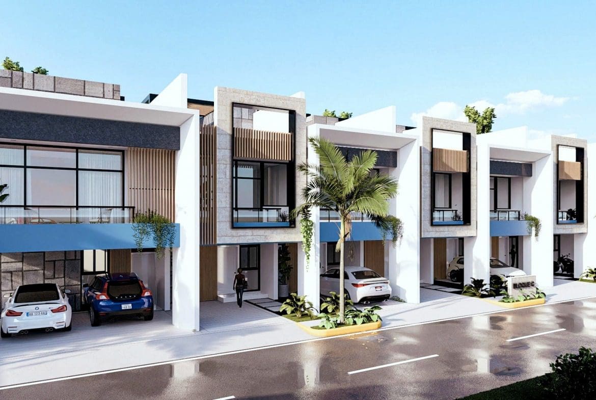 buyDRproperty Modern townhouses with carports, contemporary architecture, and sunny skies. Sosua Real Estate