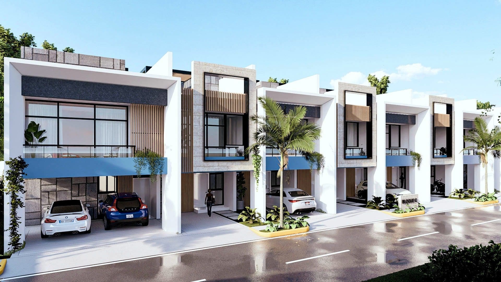 buyDRproperty Modern townhouses with carports, contemporary architecture, and sunny skies. Sosua Real Estate