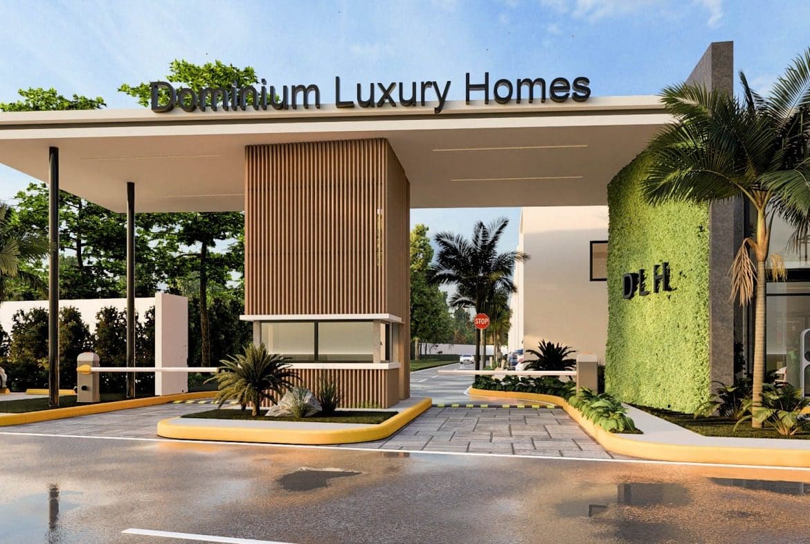 buyDRproperty Dominium Luxury Homes entrance with security booth and gate. Sosua Real Estate