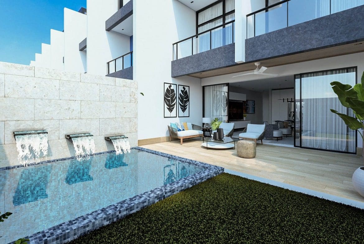 buyDRproperty Modern patio with pool and water feature, part of a beach home. Sosua Real Estate