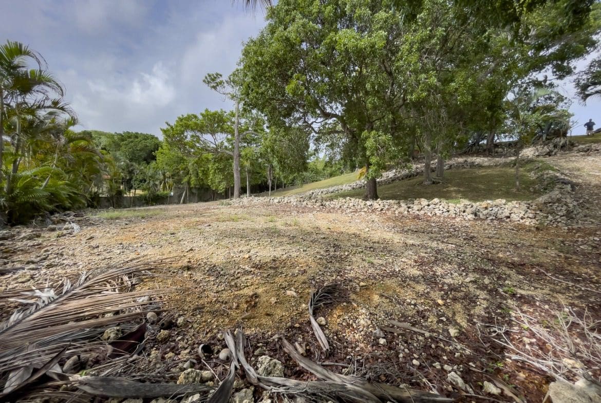 buyDRproperty Building lot with ocean views, ready for construction. Land for sale in a tropical location. Sosua Real Estate