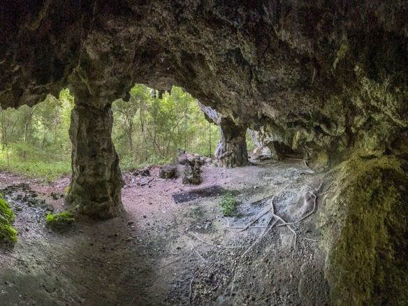 buyDRproperty Cave interior with rock formations and building lot entrance Sosua Real Estate