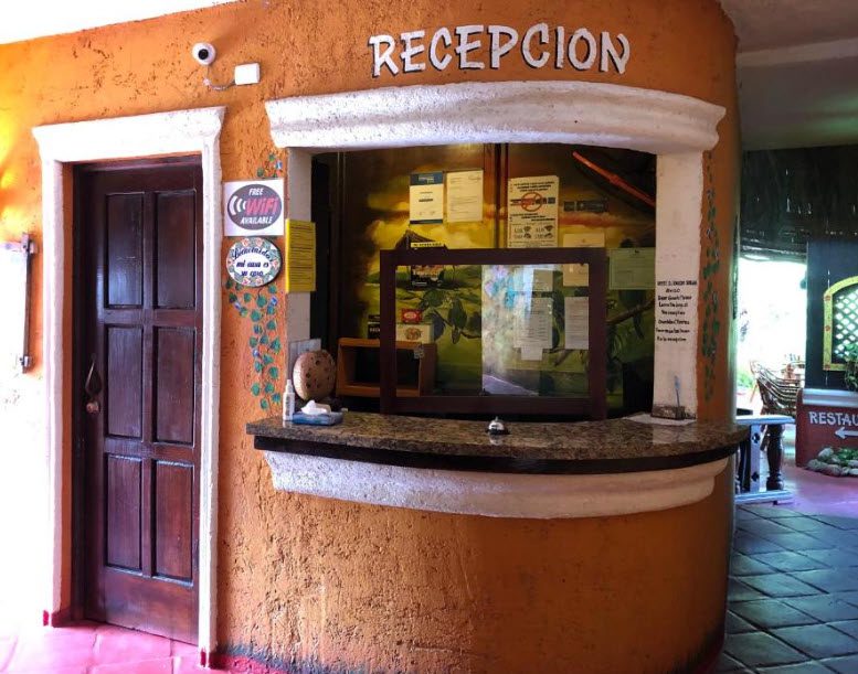 buyDRproperty Hotel reception desk with "Recepcion" sign and free WiFi available. Sosua Real Estate