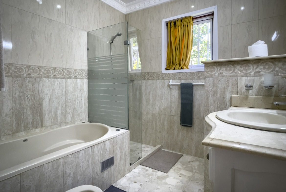 buyDRproperty Bathroom of a Prime villa with bathtub and shower. Sosua Real Estate