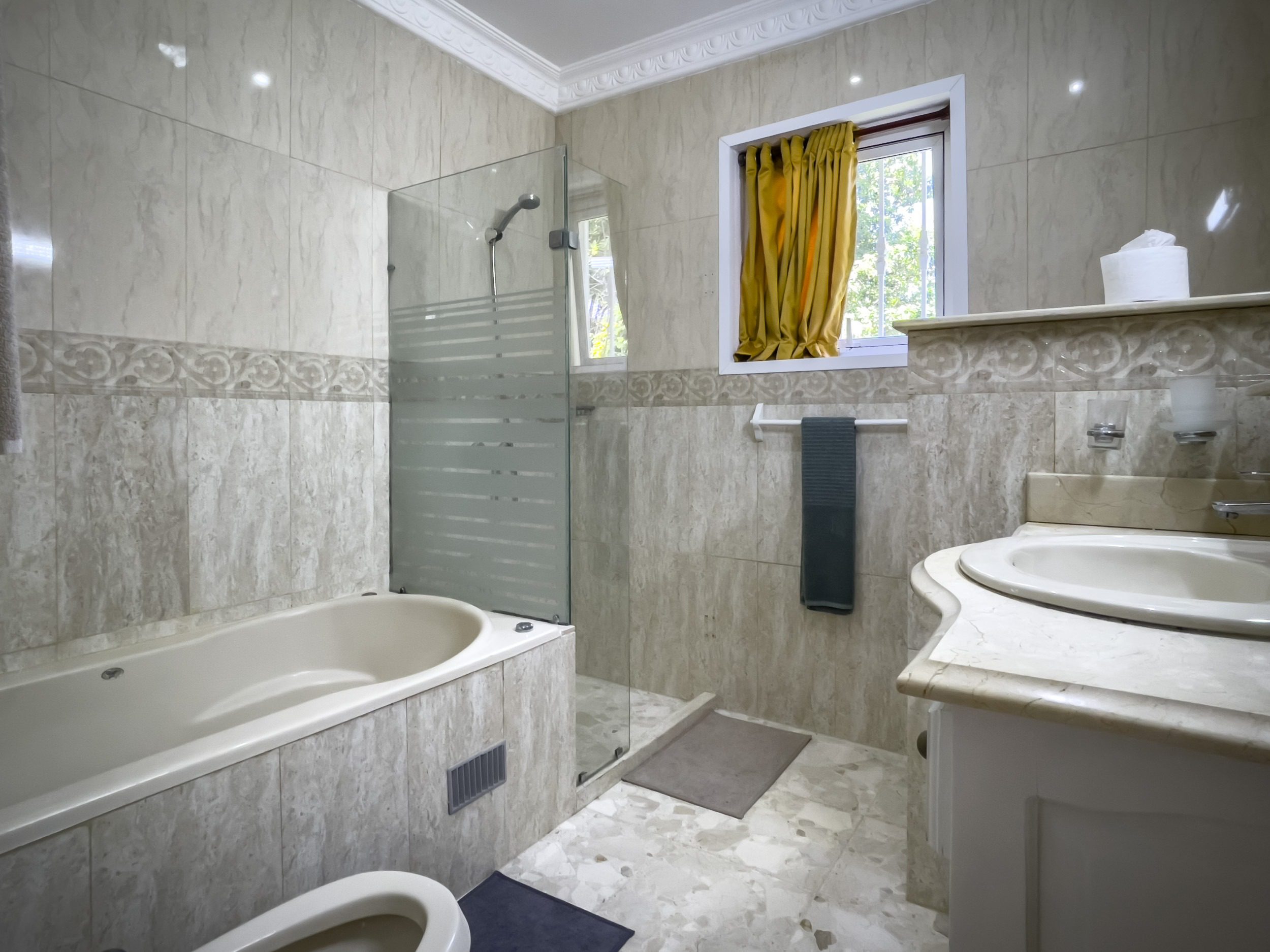 buyDRproperty Bathroom of a Prime villa with bathtub and shower. Sosua Real Estate