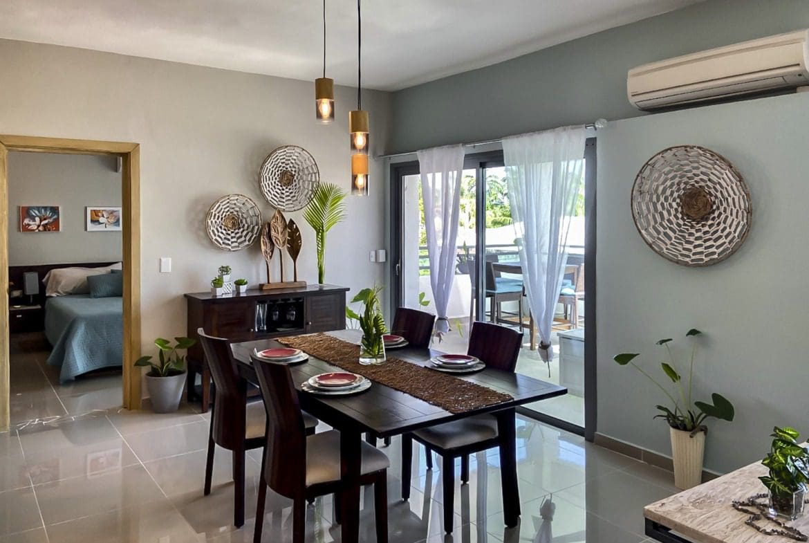 buyDRproperty Stylish dining room, perfect for entertaining in a 2-bedroom penthouse. Sosua Real Estate