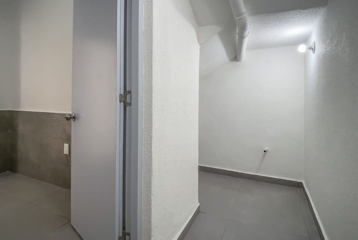 buyDRproperty Empty hallway of a modern condo for sale in Perla Marina Sosua Real Estate