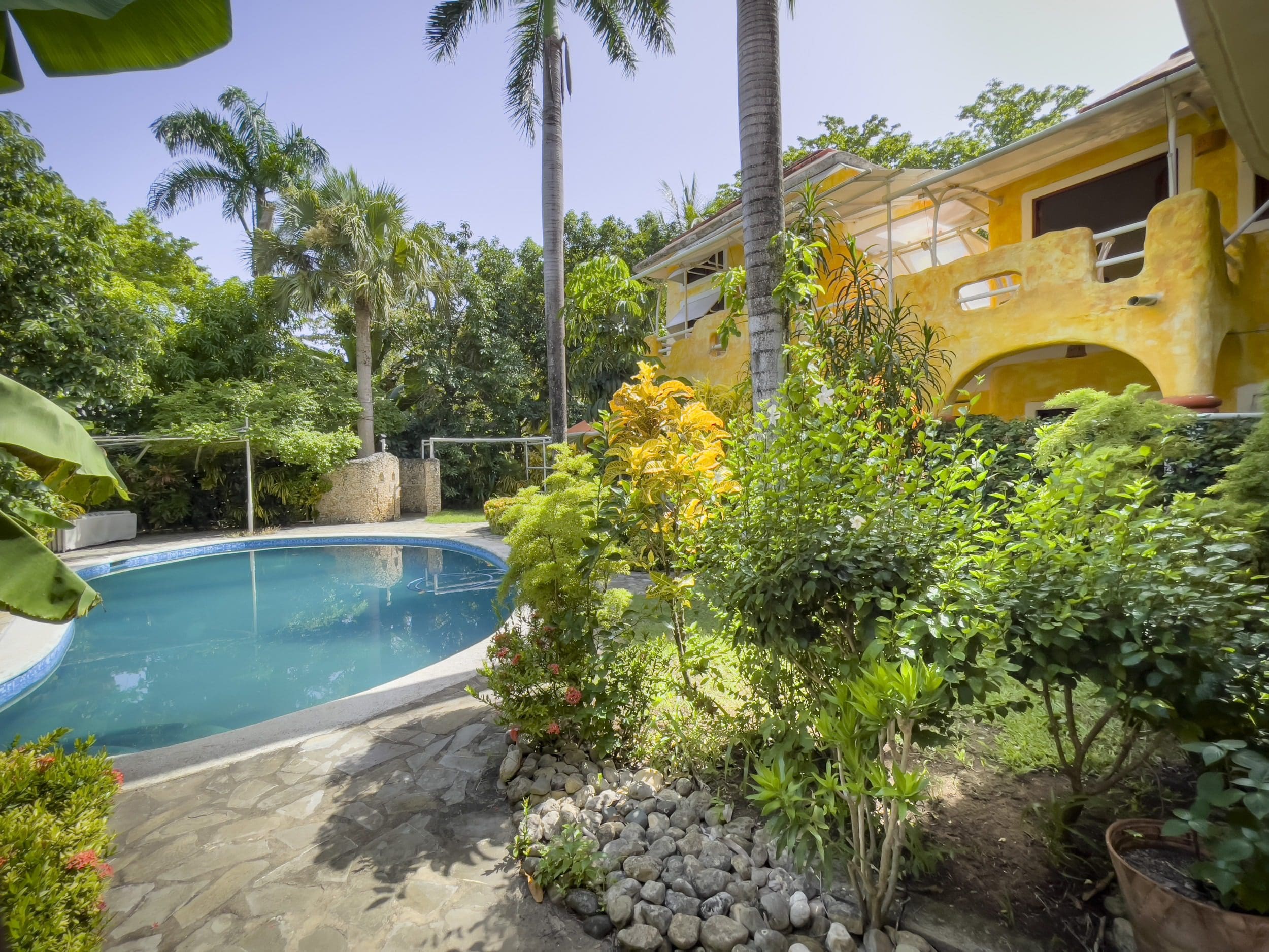 buyDRproperty Charming B&B with pool and lush landscaping Sosua Real Estate