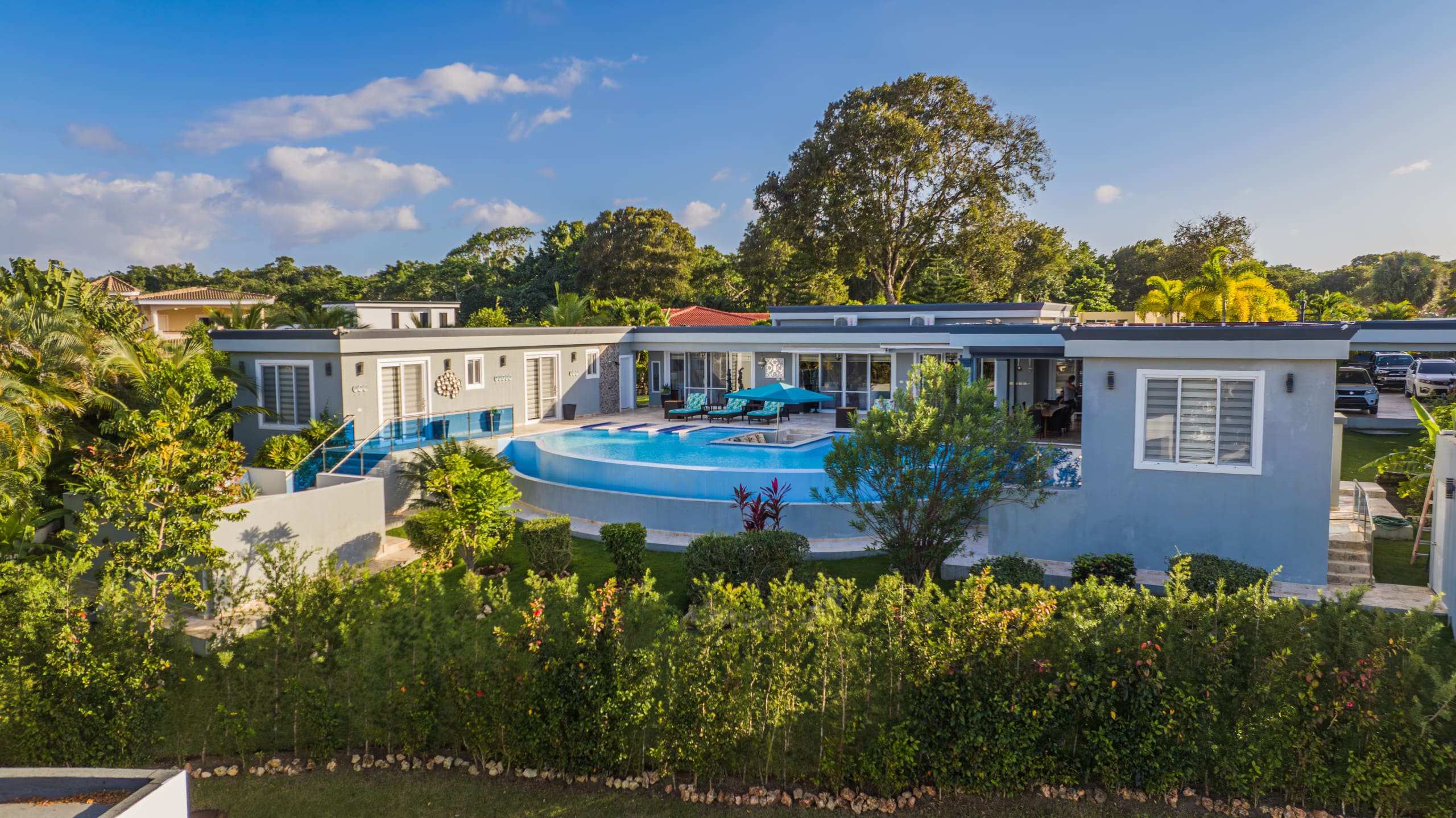 buyDRproperty Luxury 5 BR Villa with pool and lush landscaping Sosua Real Estate