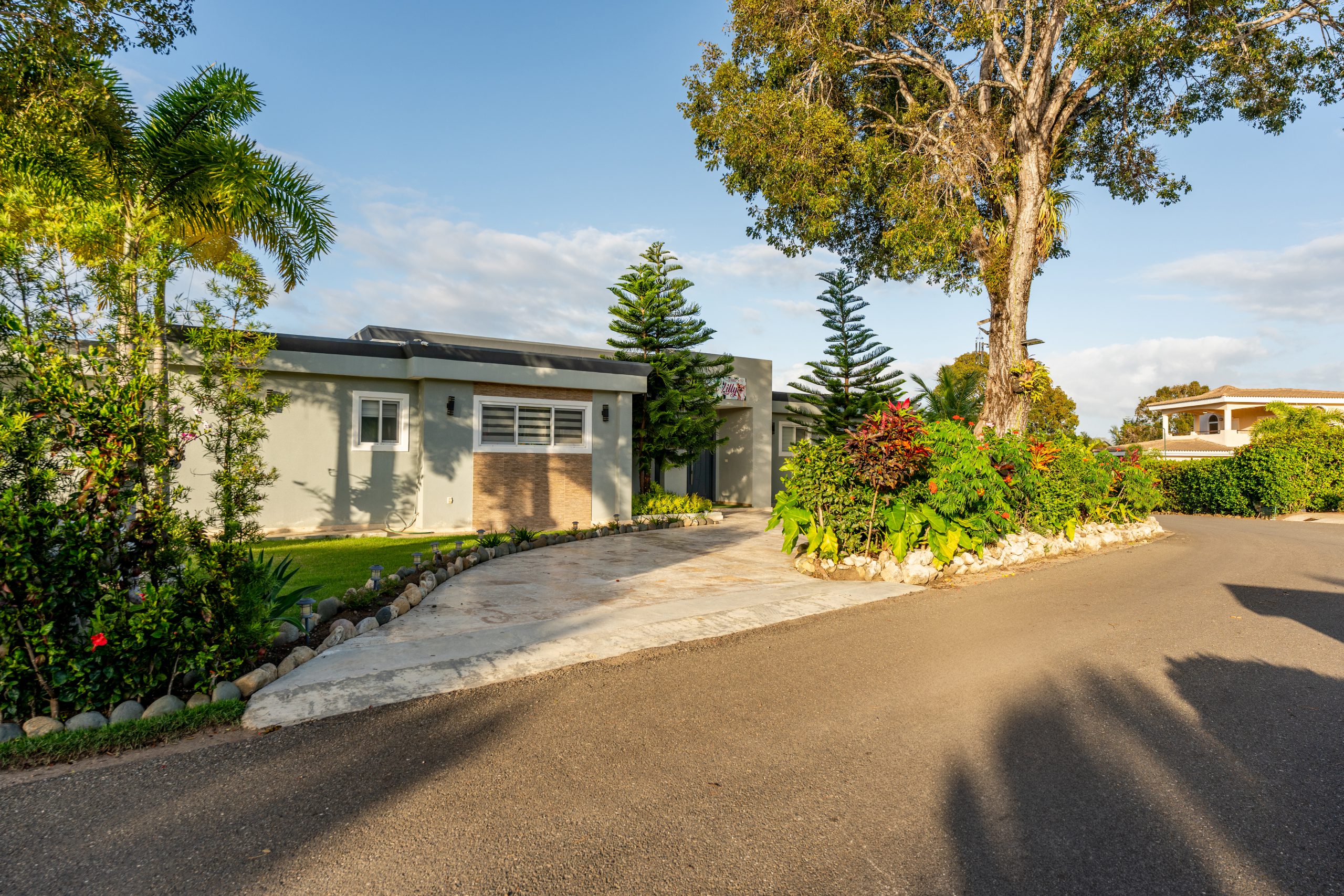 buyDRproperty Residential house with garden on a sunny day Sosua Real Estate