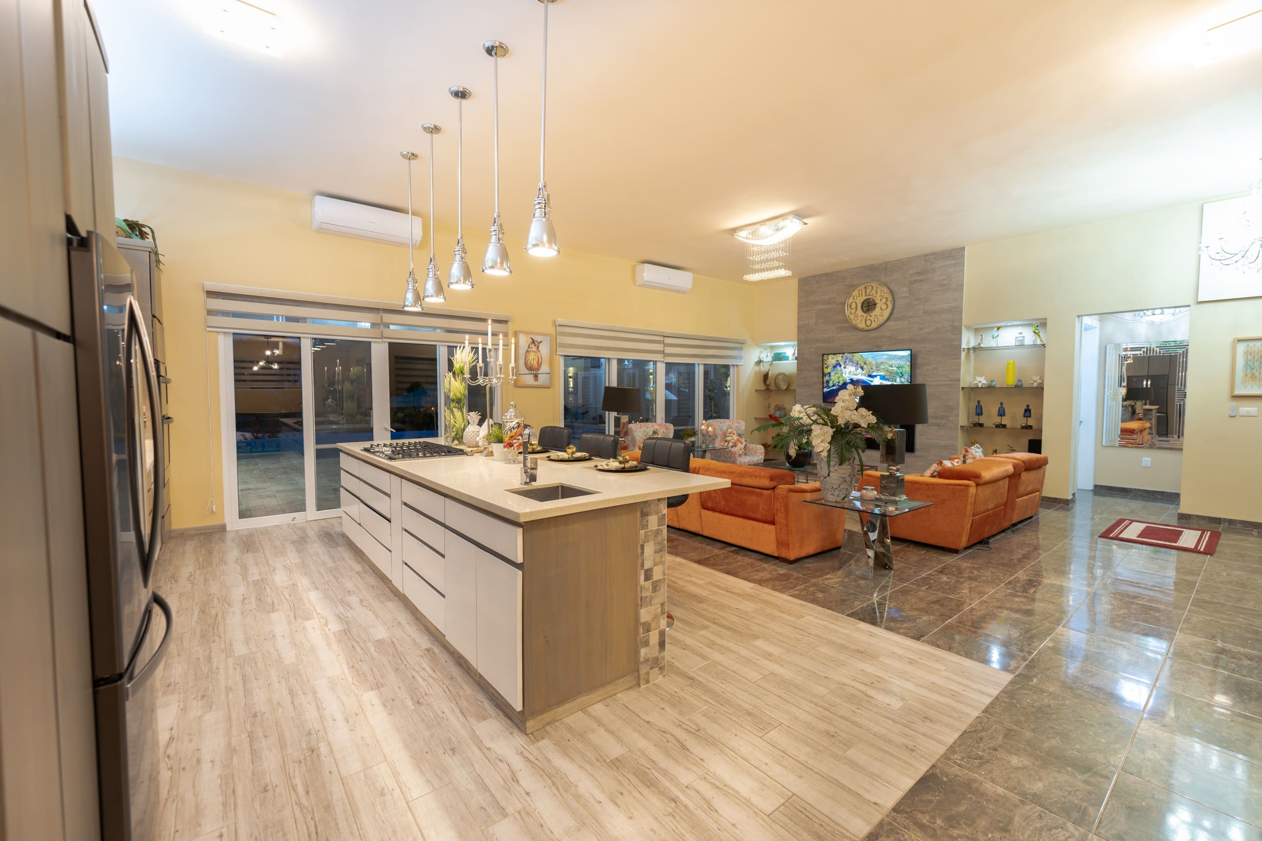 buyDRproperty Luxury 5 BR Villa interior with open kitchen and living area. Sosua Real Estate