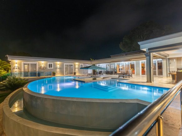 buyDRproperty Luxury 5 BR Villa with pool at night, Casa Linda V5895RCL Sosua Real Estate