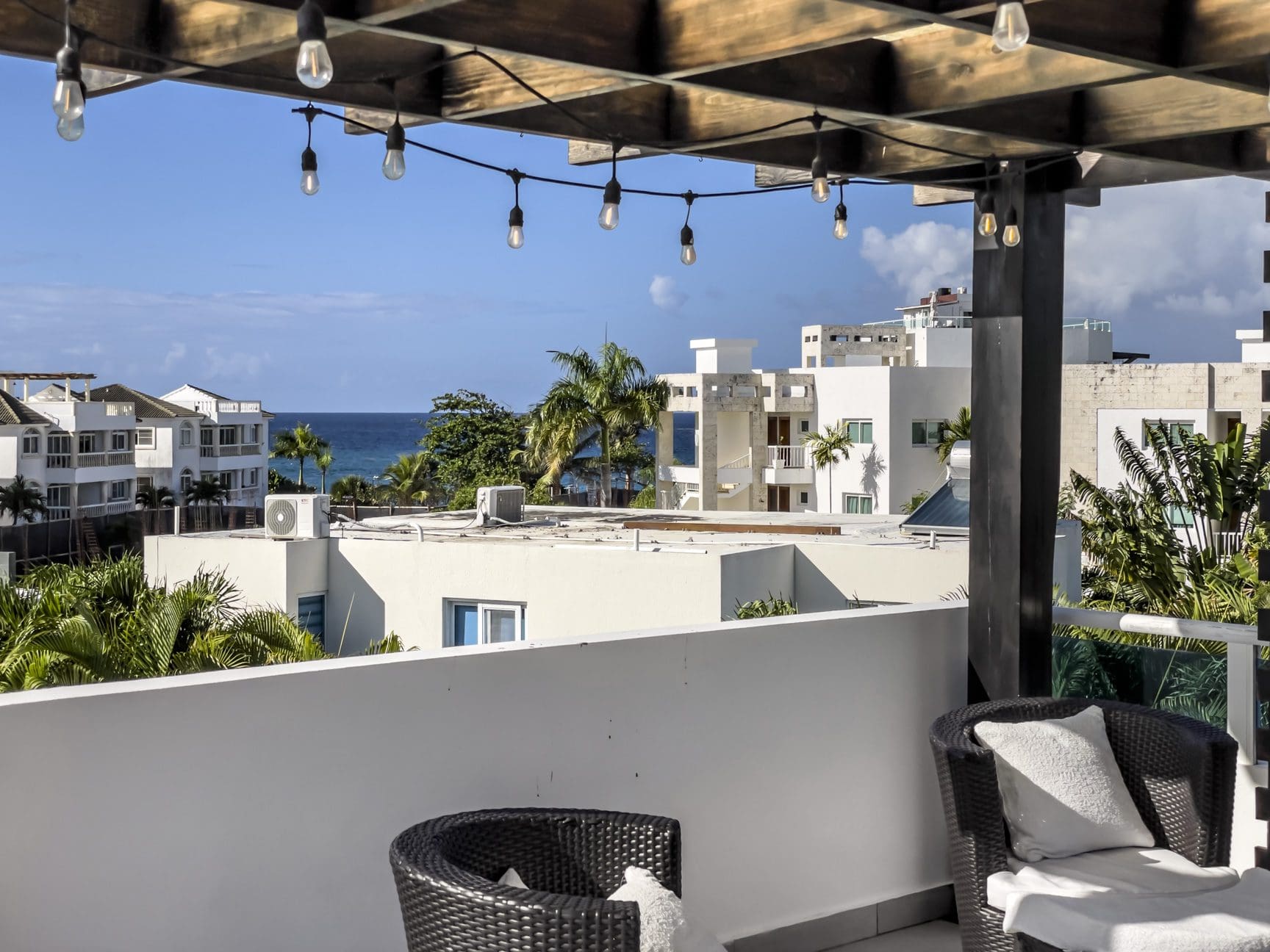 buyDRproperty Ocean view from a rooftop terrace of a Sosúa Ocean Village 3-bedroom villa for sale in the Dominican Republic. Sosua Real Estate