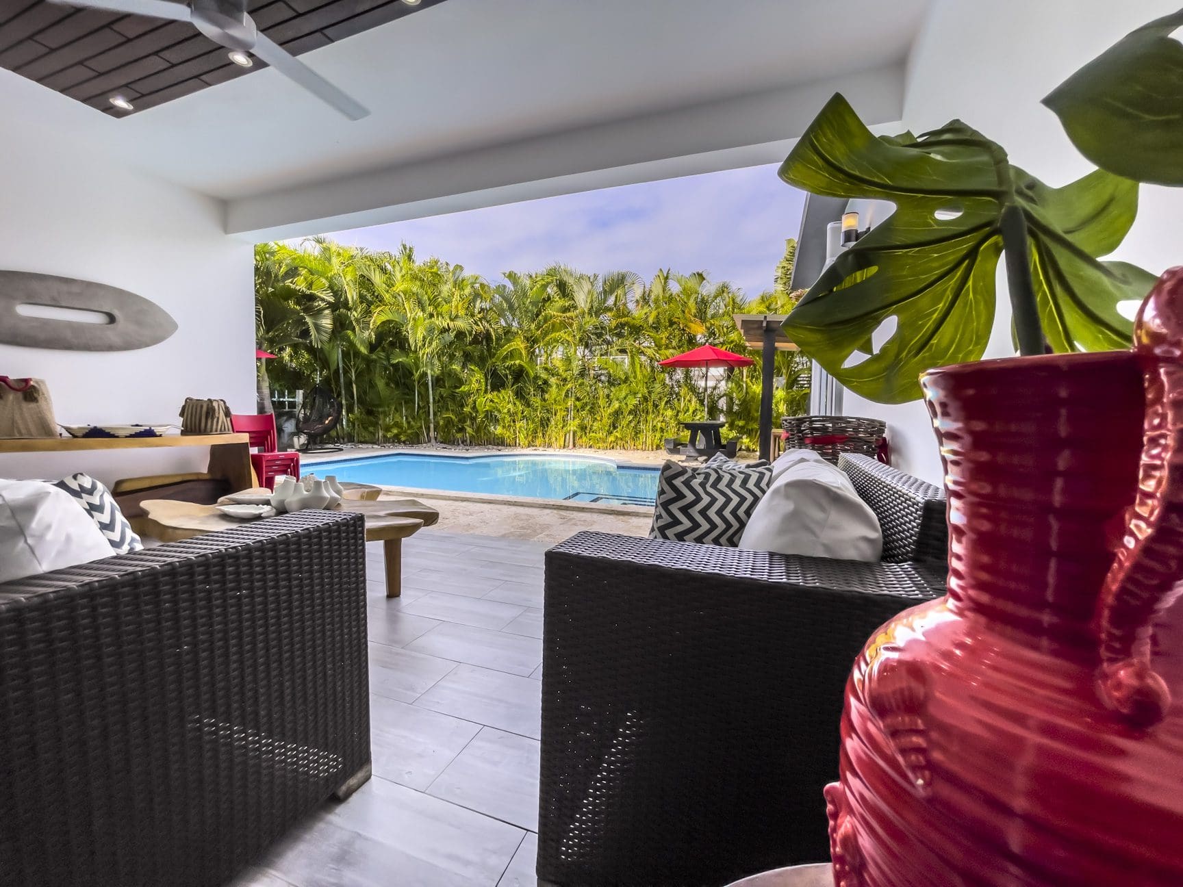 buyDRproperty Modern Sosúa Ocean Village villa for sale with pool and outdoor seating area. Sosua Real Estate