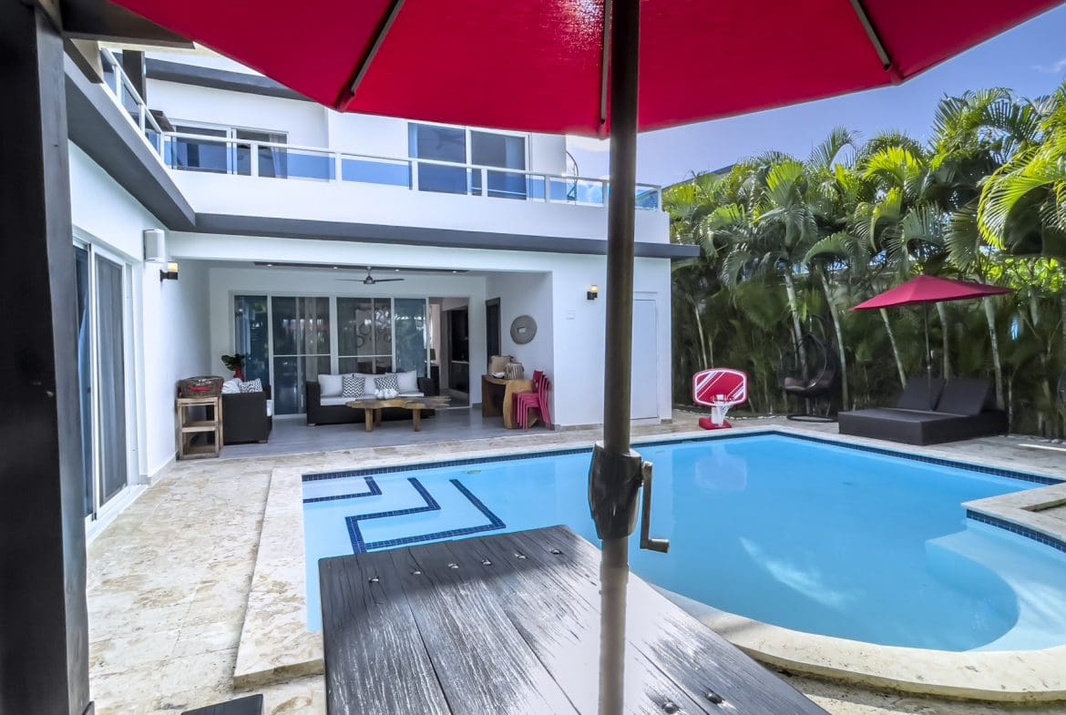 buyDRproperty Luxury Sosúa Ocean Village villa for sale with pool and outdoor living space. Sosua Real Estate