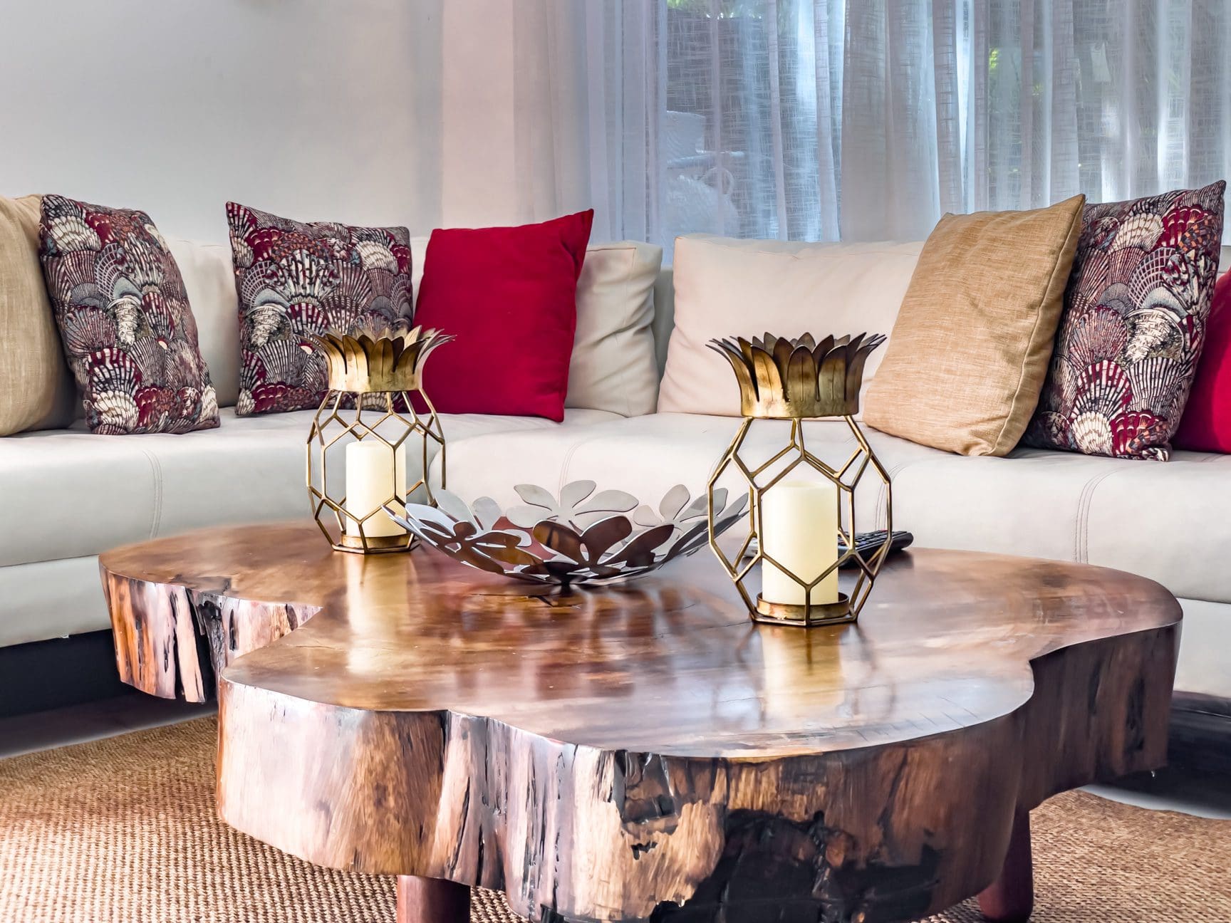 buyDRproperty Living room in a modern Sosúa Ocean Village villa with a wooden coffee table and stylish decor. Sosua Real Estate