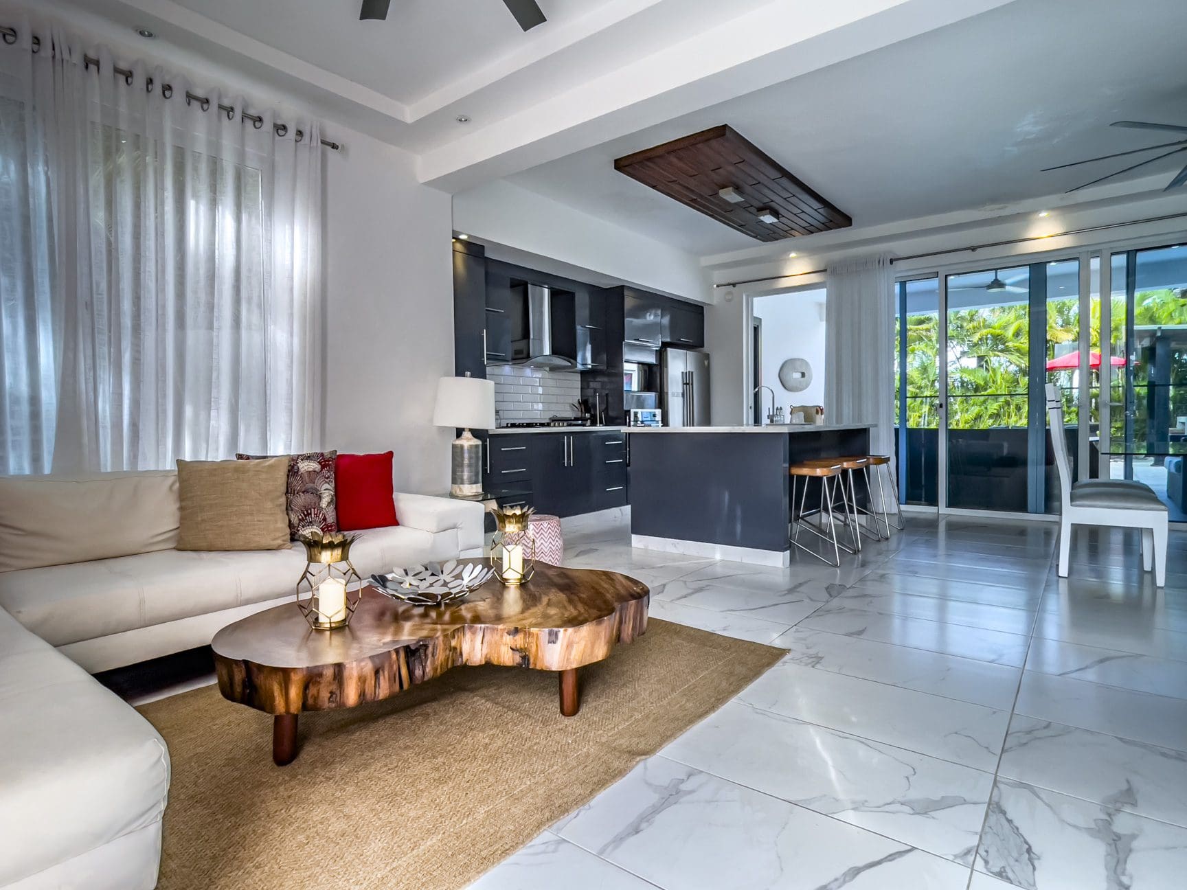 buyDRproperty Modern living room in a 3-bedroom villa for sale in Sosúa Ocean Village, Dominican Republic. Sosua Real Estate