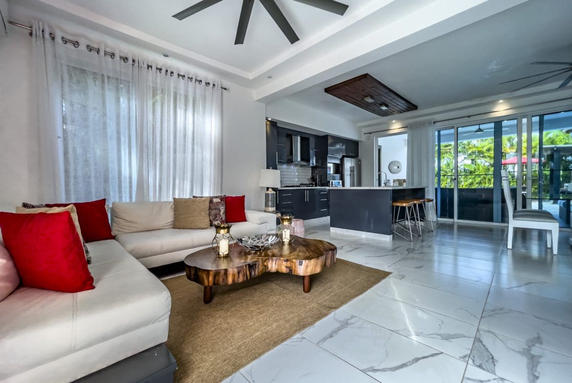 buyDRproperty Modern living room in a 3-bedroom villa for sale in Sosúa Ocean Village, Dominican Republic. Sosua Real Estate