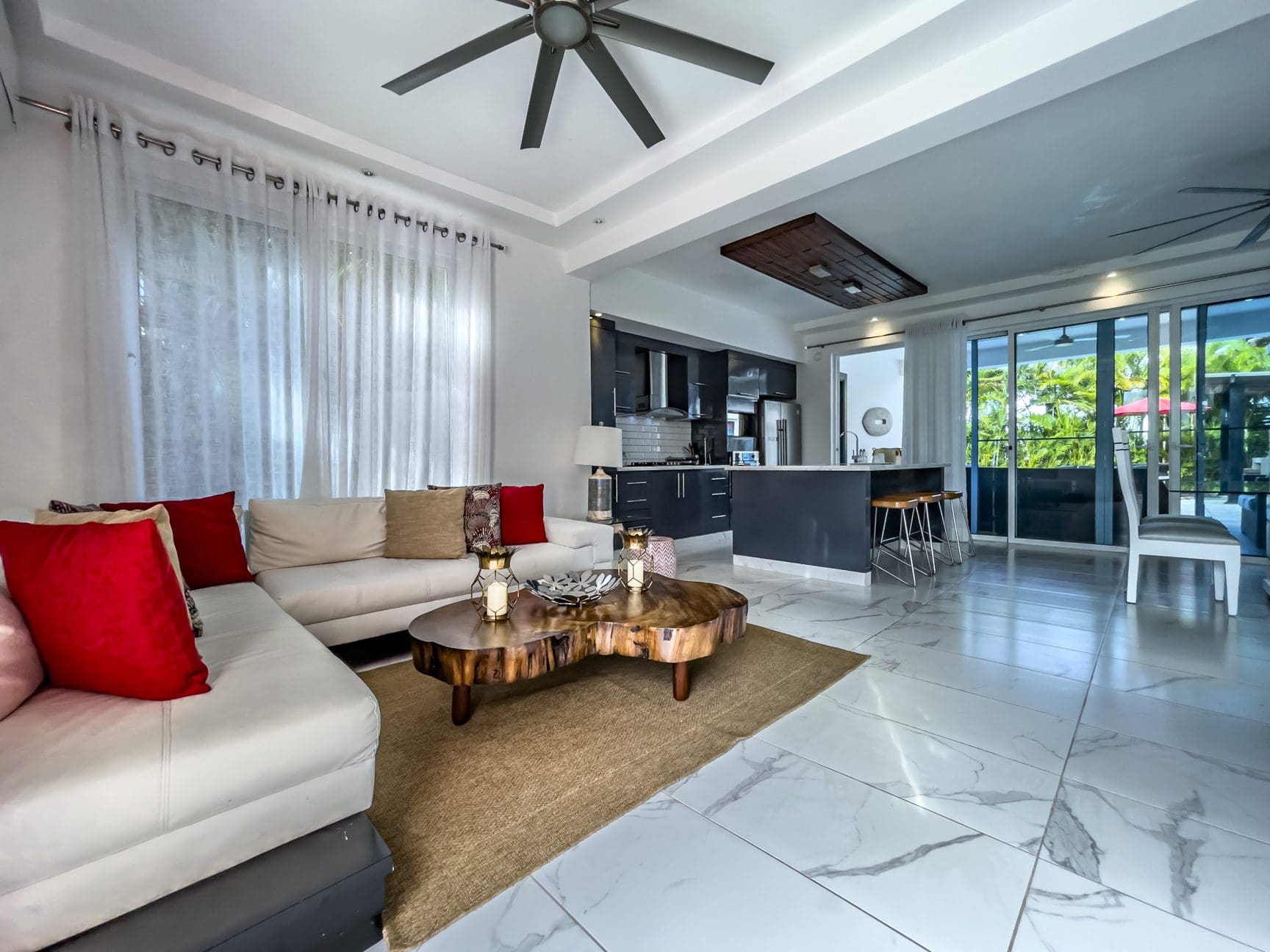 buyDRproperty Modern living room in a 3-bedroom villa for sale in Sosúa Ocean Village, Dominican Republic. Sosua Real Estate