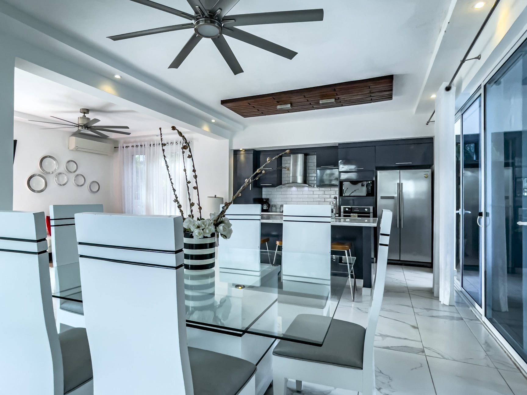 buyDRproperty Modern Sosúa Ocean Village villa for sale with dining area and kitchen Sosua Real Estate