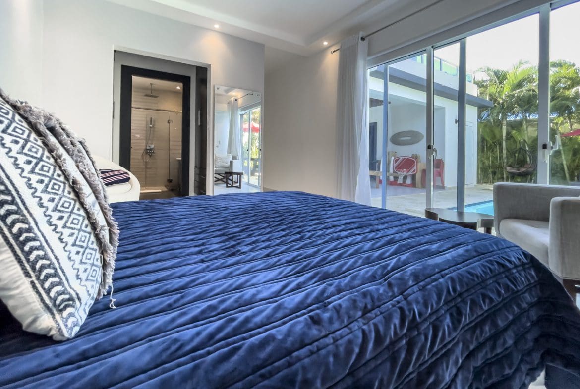 buyDRproperty Modern 3-bedroom villa bedroom with ocean view in Sosúa Ocean Village, Dominican Republic. Sosua Real Estate