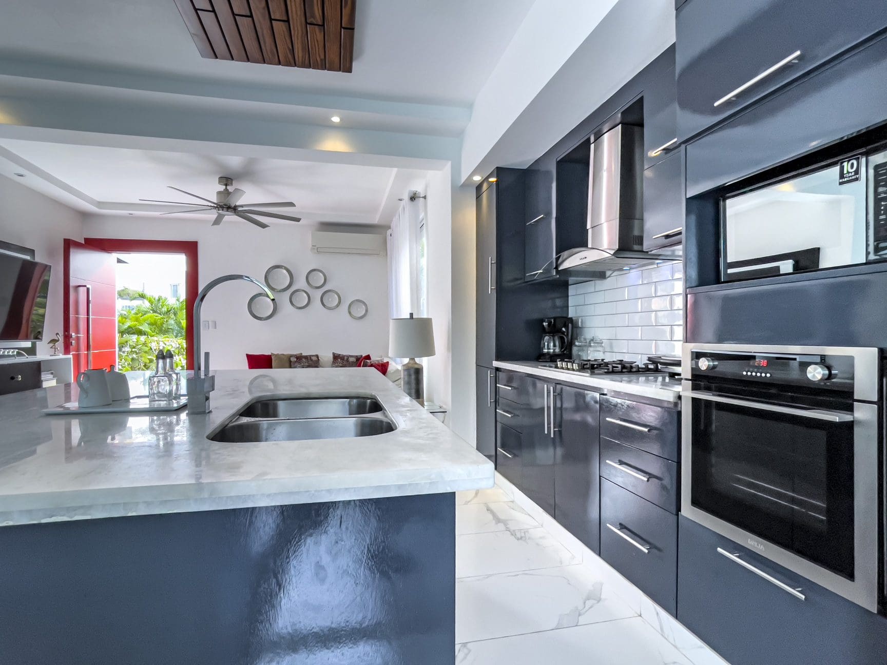 buyDRproperty Modern kitchen in a Sosúa Ocean Village 3-bedroom villa for sale in the Dominican Republic. Sosua Real Estate