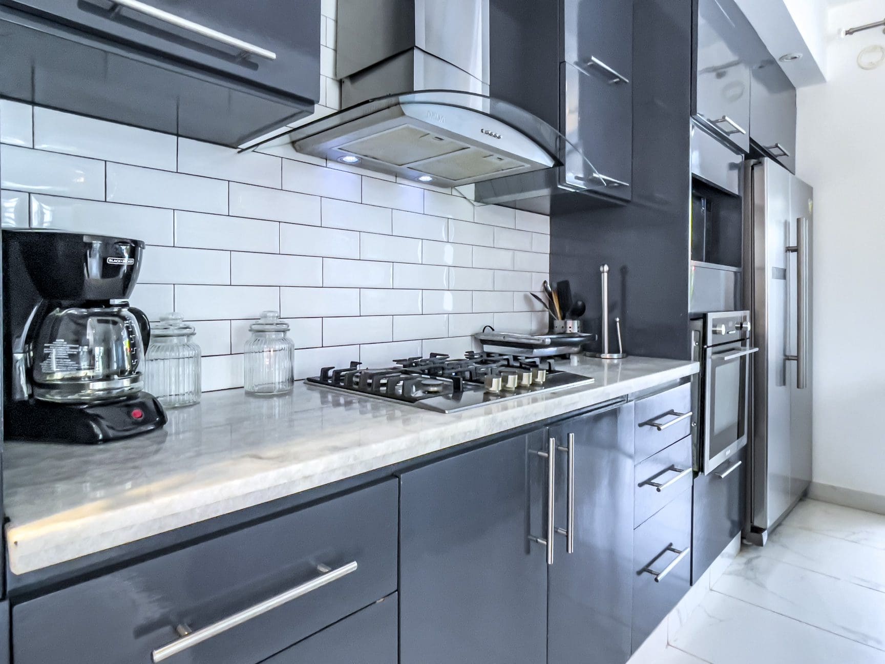 buyDRproperty Modern kitchen in a 3-bedroom villa for sale in Sosúa Ocean Village, Dominican Republic. Sosua Real Estate