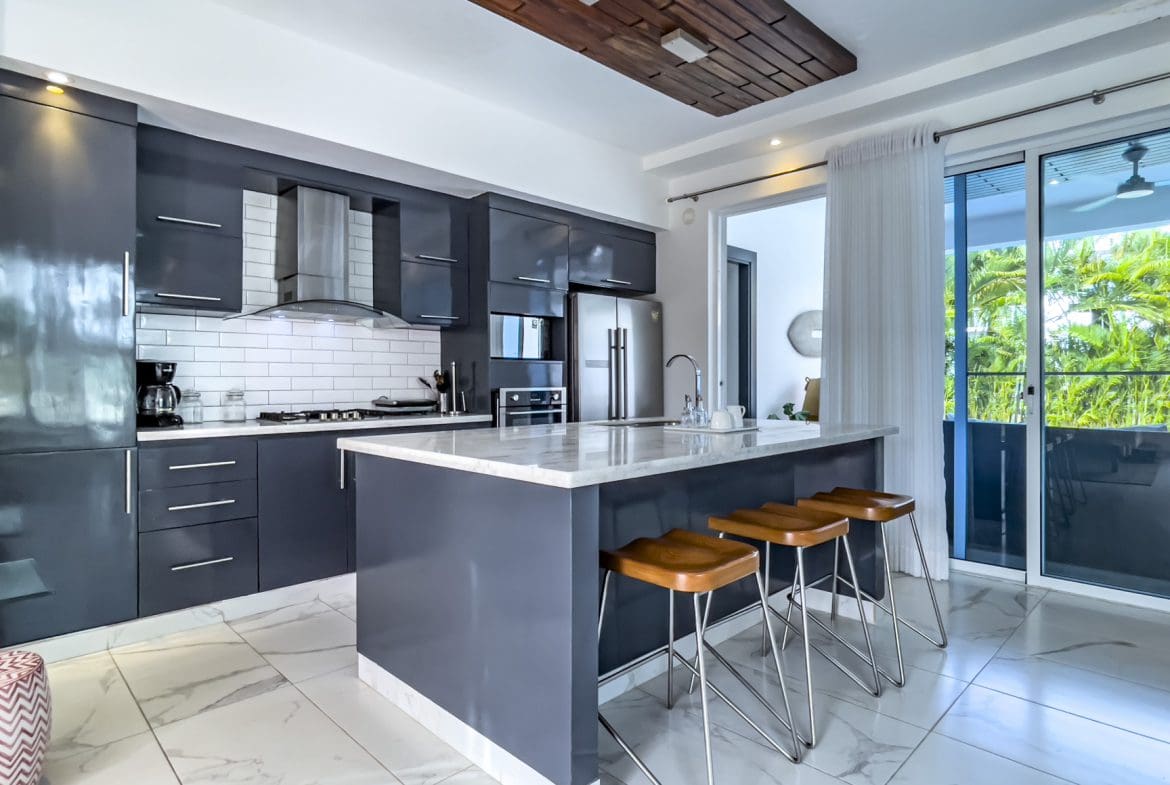 buyDRproperty Modern kitchen in a 3-bedroom villa for sale in Sosúa Ocean Village, Dominican Republic. Sosua Real Estate