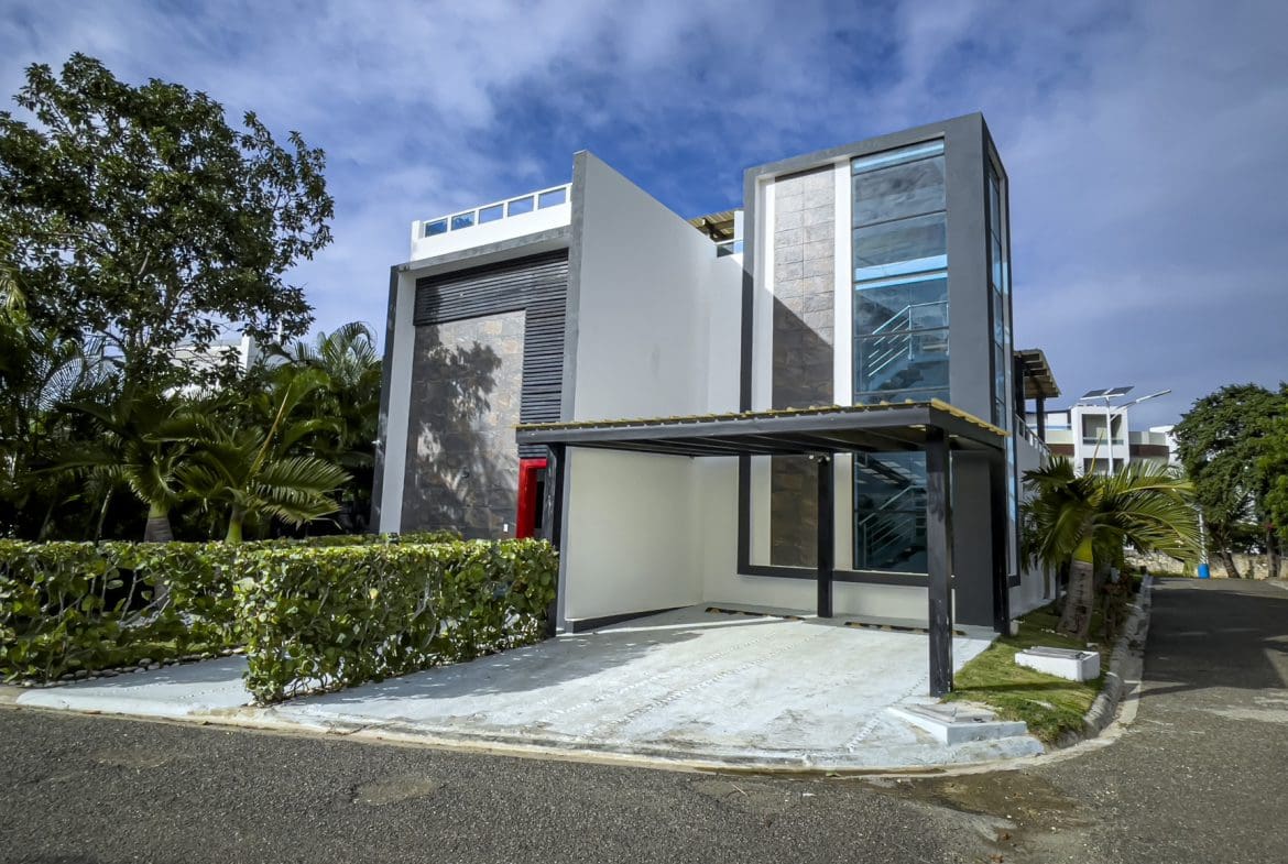 buyDRproperty Modern 3-bedroom villa for sale in Sosúa Ocean Village, Dominican Republic. Features rooftop terrace and ocean views. Sosua Real Estate