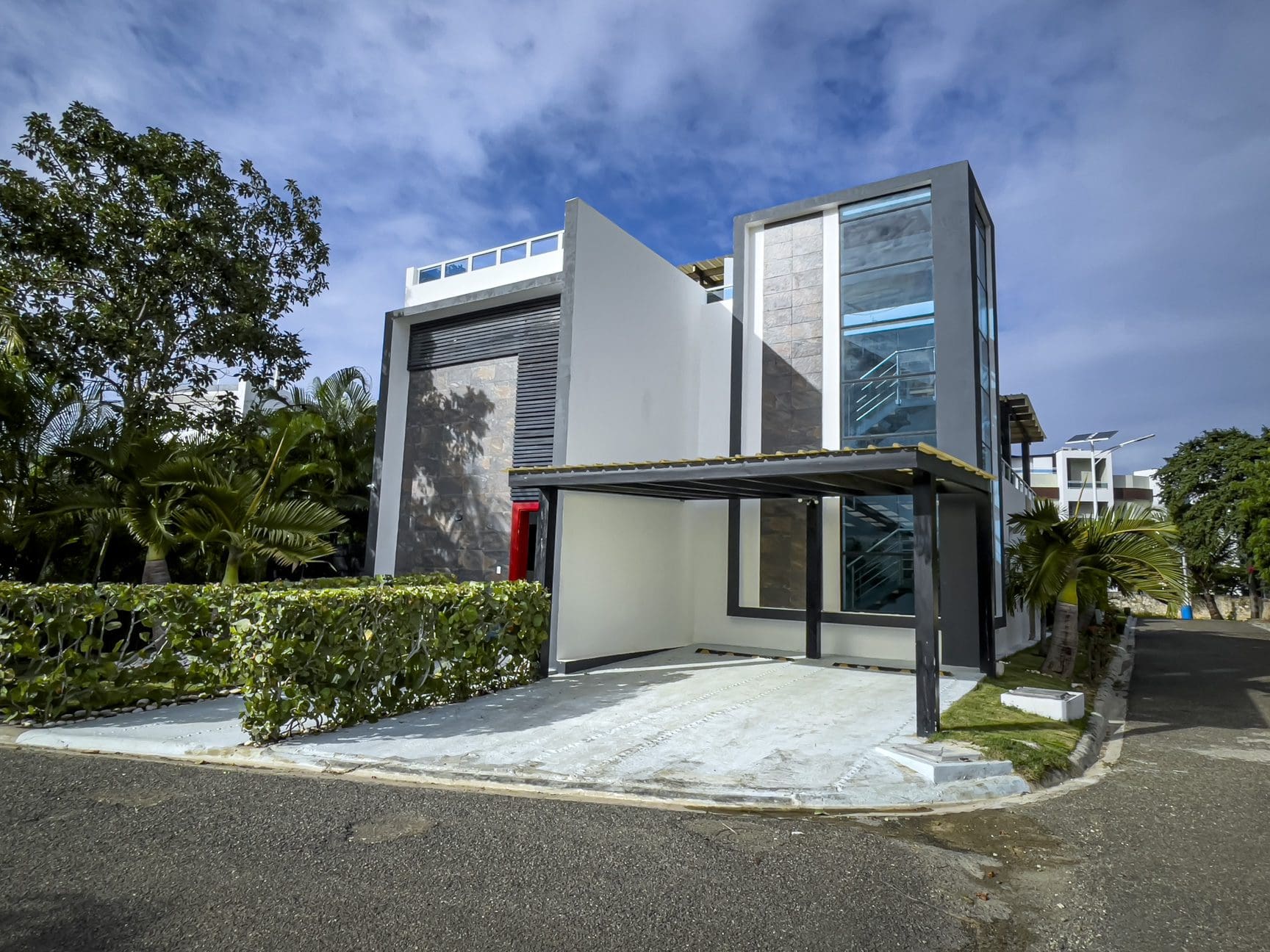 buyDRproperty Modern 3-bedroom villa for sale in Sosúa Ocean Village, Dominican Republic. Features rooftop terrace and ocean views. Sosua Real Estate