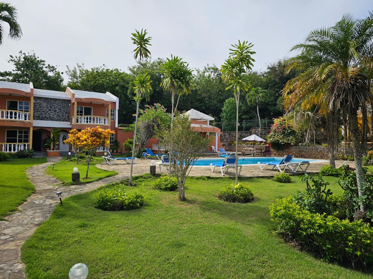 buyDRproperty Townhouse for sale near Sosua Center with pool and palm trees. Sosua Real Estate