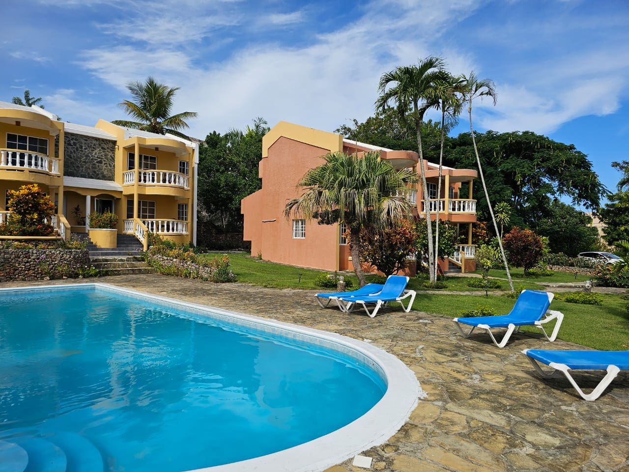 buyDRproperty Tropical resort with pool and lounge chairs, a great place to relax. Sosua Real Estate