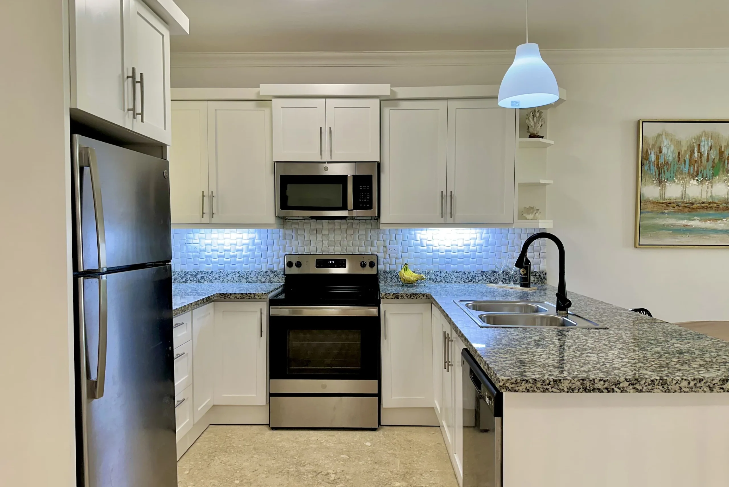 buyDRproperty Modern kitchen in a 2-bedroom condo for sale Sosua Real Estate