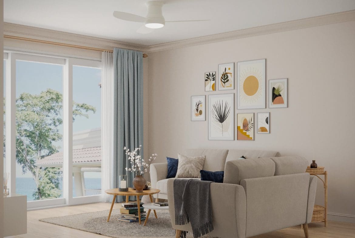 buyDRproperty Cozy living room with a sofa, artwork, and a view of the ocean. Special Offer. Sosua Real Estate