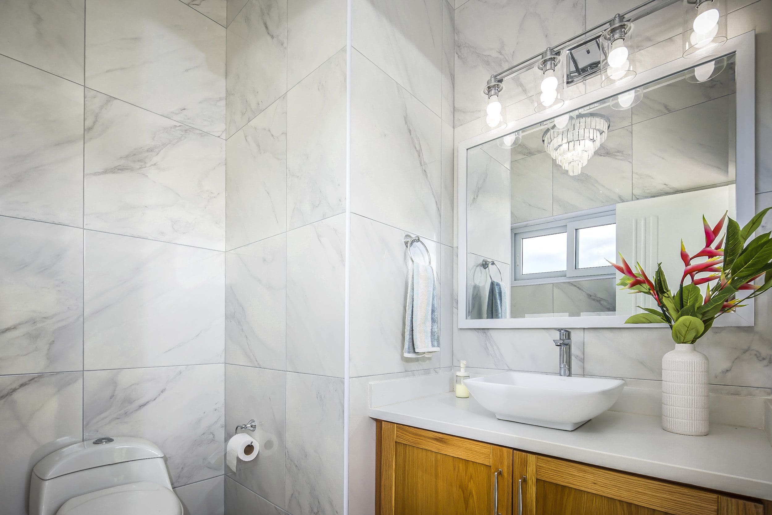 buyDRproperty Modern bathroom with marble tile and a villa for sale in Casa Linda. Sosua Real Estate
