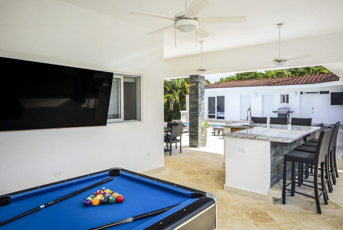 buyDRproperty Luxury villa for sale in Casa Linda with pool table and outdoor kitchen. Sosua Real Estate