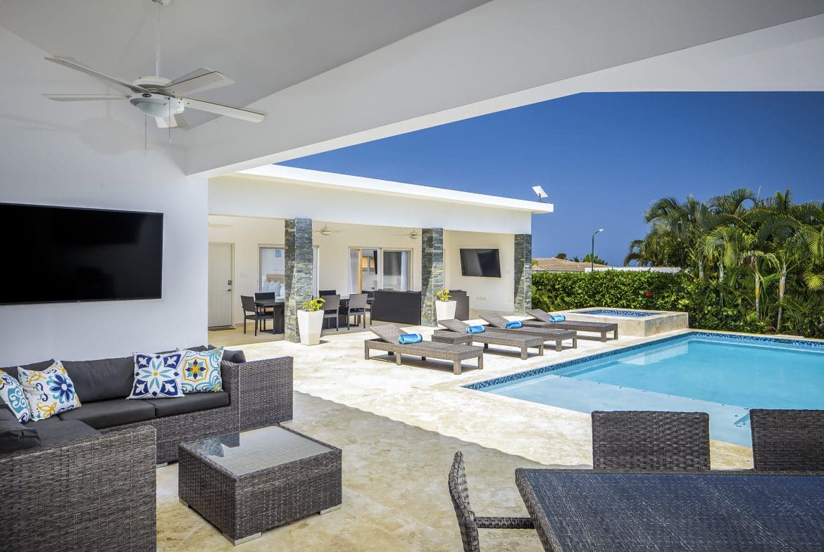 buyDRproperty Luxury villa for sale in Casa Linda with pool and outdoor seating area. Sosua Real Estate