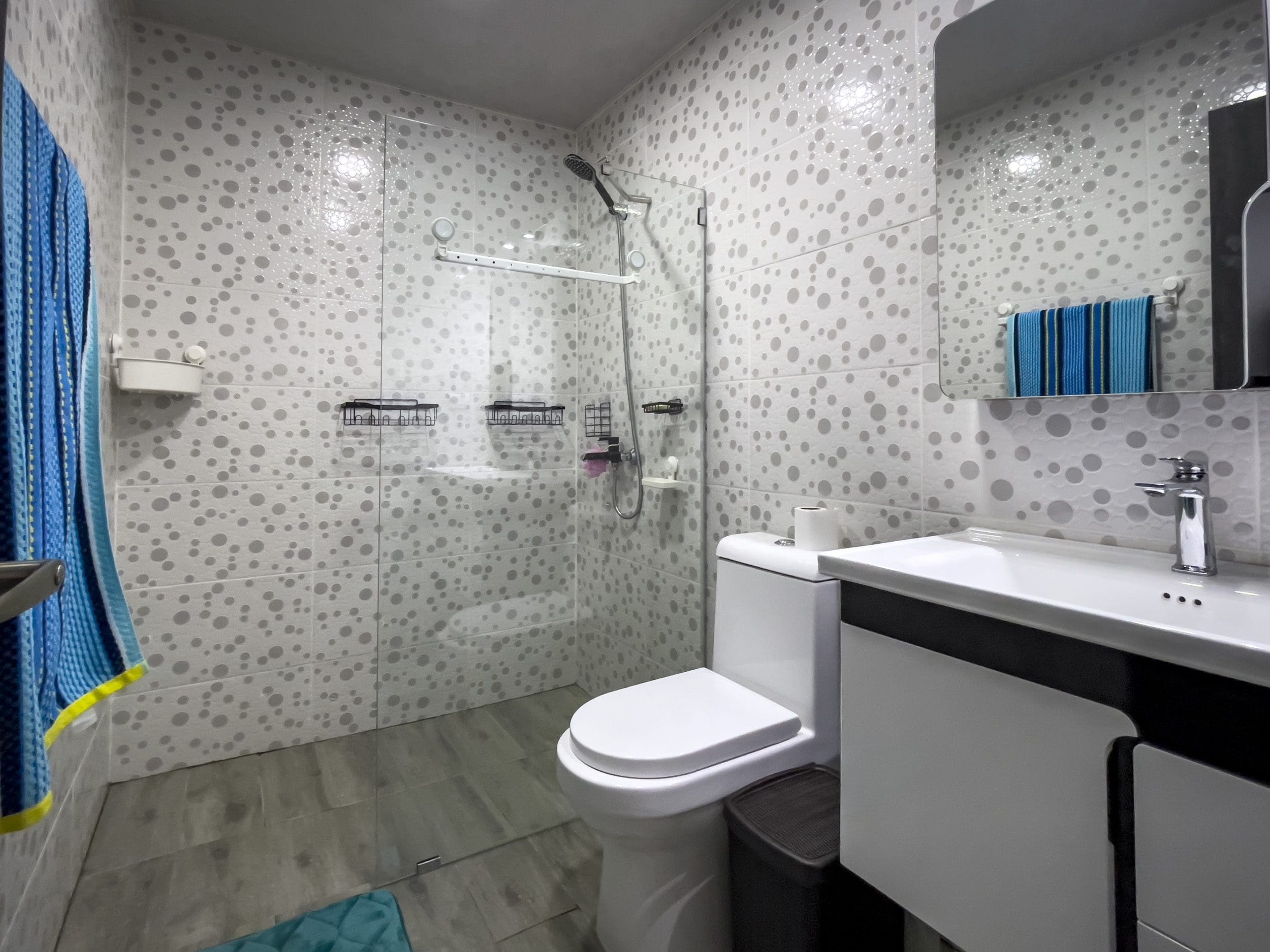 buyDRproperty Modern bathroom with shower and toilet in a one bedroom condo. Sosua Real Estate